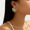 Women's Exaggerated Retro Flower Earrings In Electroplated Iron With Old Money Style Design