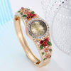 Women's Fashion Alloy Bracelet Quartz Watch With Diamonddecorated Flower And Round Dial