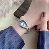Women's Fashion Alloy Bracelet Watch With Cut Out Design And Roman Numerals