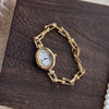 Women's Fashion Alloy Bracelet Watch With Cut Out Design And Roman Numerals