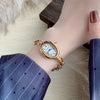 Women's Fashion Alloy Bracelet Watch With Cut Out Design And Roman Numerals