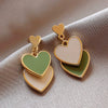Women's Fashion Geometric Heart Shaped Pendant Earrings Alloy With Silver Needle Electroplated Love Earrings