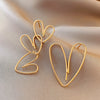 Women's Fashion Geometric Heart Shaped Pendant Earrings Alloy With Silver Needle Electroplated Love Earrings