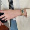 Women's Fashion Retro Oval Metal Case Fine Steel Strap Quartz Watch