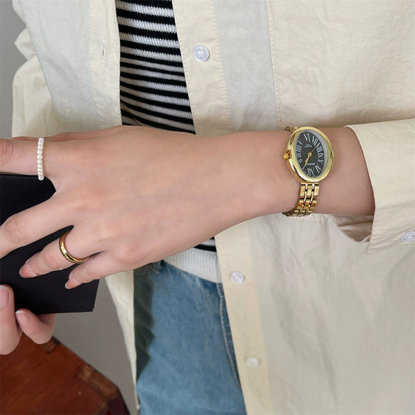 Women's Fashion Retro Oval Metal Case Fine Steel Strap Quartz Watch
