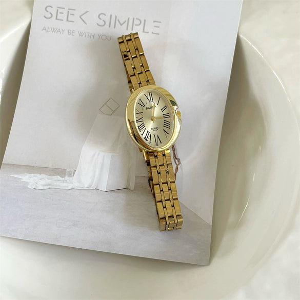 Women's Fashion Retro Oval Metal Case Fine Steel Strap Quartz Watch