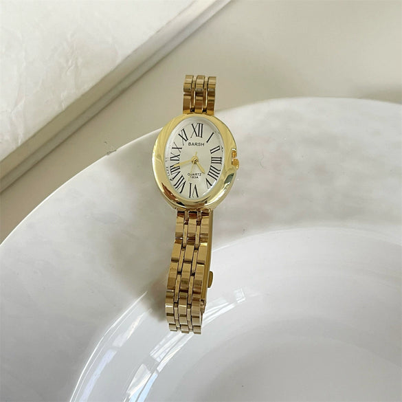 Women's Fashion Retro Oval Metal Case Fine Steel Strap Quartz Watch