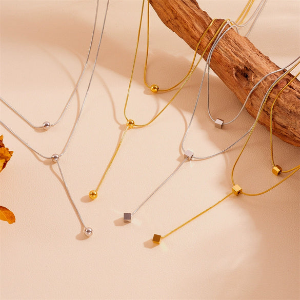 Women's Fashion Stainless Steel And Titanium Steel Neck Chain With Geometric Pattern Steel Ball And Square Tassel Design