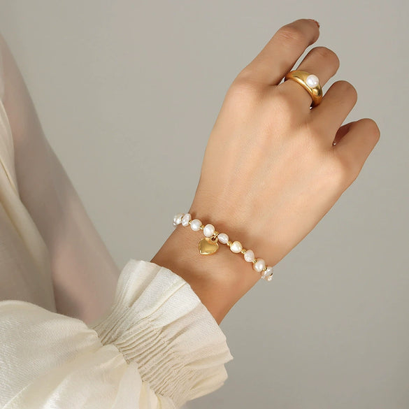 Women's Fresh Water Pearl Stitching Steel Ball Peach Heart Pendant Titanium Steel Bracelet With Distinctive And Creative Design