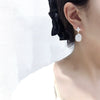 Women's Freshwater Pearl S925 Sterling Silver Earrings With Four Leaf Clover Design And Oblate Shape