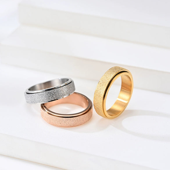 Women's Frosted Pearl Sand Geometric Rotatable Titanium Steel Decompression Ring With Electroplated Finish Fashion Jewelry