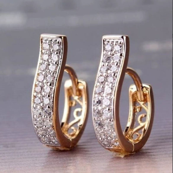 Women's Geometric Diamond Earrings In Electroplated Alloy With A Curved Statement Design For Fashion Jewelry Collections