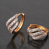 Women's Geometric Diamond Earrings In Electroplated Alloy With A Curved Statement Design For Fashion Jewelry Collections