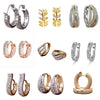 Women's Geometric Diamond Earrings In Electroplated Alloy With A Curved Statement Design For Fashion Jewelry Collections