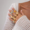 Women's Geometric Irregular Curved Ring In Goldplated Titanium Steel With A Polished Glossy Finish