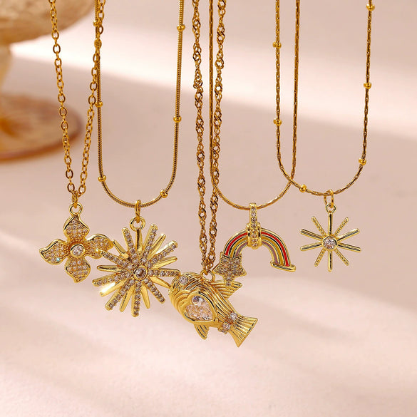 Women's Geometric Starburst Sun Pendant Necklace With Gold Plated Copper Zircon Accents And Ball Chain Wholesale Jewelry