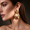 Women’s Gold Plated Alloy Earrings With Asymmetrical Leaf And Bow Design Hammered Texture Three Dimensional Statement Jewelry
