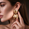 Women’s Gold Plated Alloy Earrings With Asymmetrical Leaf And Bow Design Hammered Texture Three Dimensional Statement Jewelry