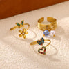 Women's Gold Plated Open Ring With Diamond Heart Butterfly Flower Crystal And Layered Tassel Design