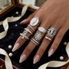 Women's Gold Plated Stainless Steel Ring With Geometric Cross And Camellia Flower Design Smooth Polished Finish