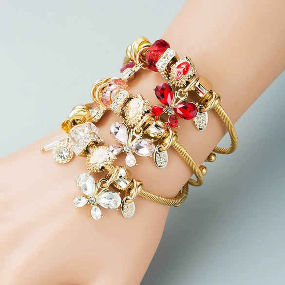 Women's Gold Tone Butterfly Multi Element Pendant Bracelet In Alloy With Electroplated Finish