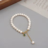 Women's Handmade Freshwater Pearl Beaded Bracelet With Geometric Design And Small Pendant