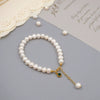 Women's Handmade Freshwater Pearl Beaded Bracelet With Geometric Design And Small Pendant