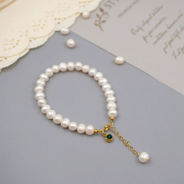 Women's Handmade Freshwater Pearl Beaded Bracelet With Geometric Design And Small Pendant
