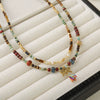 Women's Handmade Natural Stone Beaded Necklace With Copper And Stainless Steel Bow Pendant