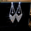 Women's Highend Copper Geometric Zircon Tassel Earrings