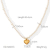 Women's Imitation Pearl Heart Pendant Necklace With Geometric Design And Electroplating
