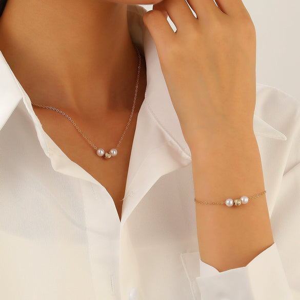 Women's Imitation Pearl Jewelry Threepiece Set With Heart Water Drop Bell Patterns And Alloy Pendants Set With Diamonds