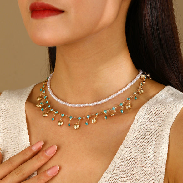 Women's Imitation Pearl Jewelry Threepiece Set With Heart Water Drop Bell Patterns And Alloy Pendants Set With Diamonds