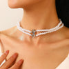 Women's Imitation Pearl Jewelry Threepiece Set With Heart Water Drop Bell Patterns And Alloy Pendants Set With Diamonds