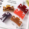 Women's Large Geometric Resin Hair Claw Clip With Hollow Design And Painted Finish For Ponytail Updos
