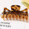 Women's Large Geometric Resin Hair Claw Clip With Hollow Design And Painted Finish For Ponytail Updos