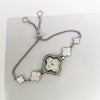 Women's Leisure Alloy And Stainless Steel Fourleaf Clover Flower Shape Diamondencrusted Quartz Bracelet Watch