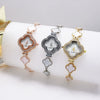 Women's Leisure Alloy And Stainless Steel Fourleaf Clover Flower Shape Diamondencrusted Quartz Bracelet Watch