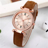 Women's Leisure Alloy Case Imitation Leather Strap Quartz Watch With Sun Pattern And Round Dial