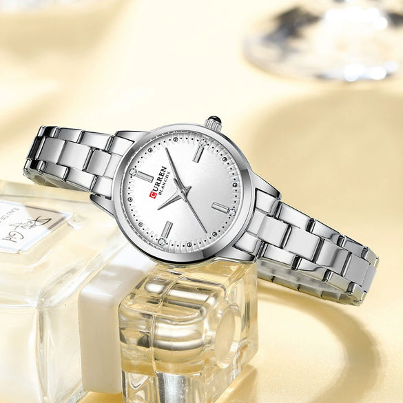 Women's Leisure Quartz Watch With Alloy Case Stainless Steel Band And Round Dial Set With Rhinestones