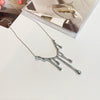 Women's Light Luxury Alloy Water Drop Lava Pendant Necklace Electroplated Clavicle Chain With Trendy Minimalist Sweater Chain Style