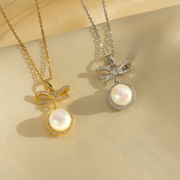 Women's Light Luxury Microinlaid Bow Pearl Pendant Titanium Steel Necklace With Electroplating