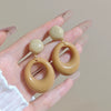 Women's Light Luxury Retro Style Zinc Alloy Geometric Circle Contrast Color Stud Earrings With Electroplating