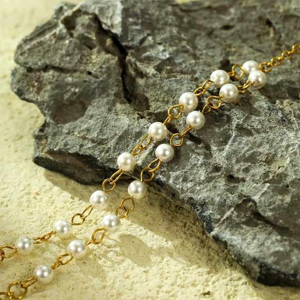 Women's Light Luxury Style Stainless Steel And 18K Gold Hand Jewelry With Pearl Bracelet And Finger Chain Integrated