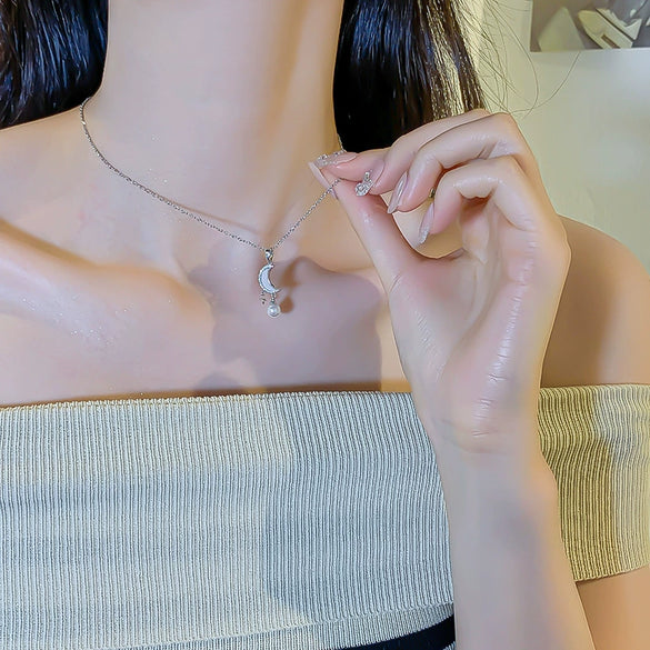 Women's Light Luxury Titanium Steel And Copper Moon Star Pendant Tassel Clavicle Necklace With Geometric Pattern And Cross Chain