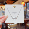 Women's Light Luxury Titanium Steel Necklace With Geometric Pattern And Inlaid Zircon Pendant On Cross Chain