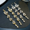 Women's Luxury Flower And Leaf Pattern Alloy Electroplated Tassel Long Ear Stud Earrings