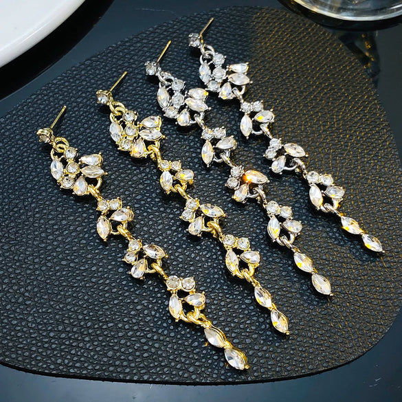 Women's Luxury Flower And Leaf Pattern Alloy Electroplated Tassel Long Ear Stud Earrings