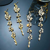 Women's Luxury Flower And Leaf Pattern Alloy Electroplated Tassel Long Ear Stud Earrings