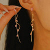 Women's Luxury Flower And Leaf Pattern Alloy Electroplated Tassel Long Ear Stud Earrings